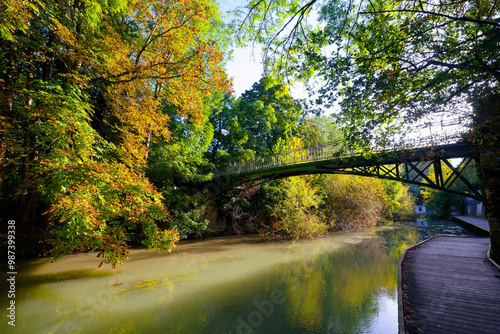 Bridge over Marne river along the   Charentonneau island in Maison-Alfort city photo