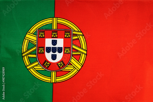 National flag of the state of Portugal close-up. State background. photo