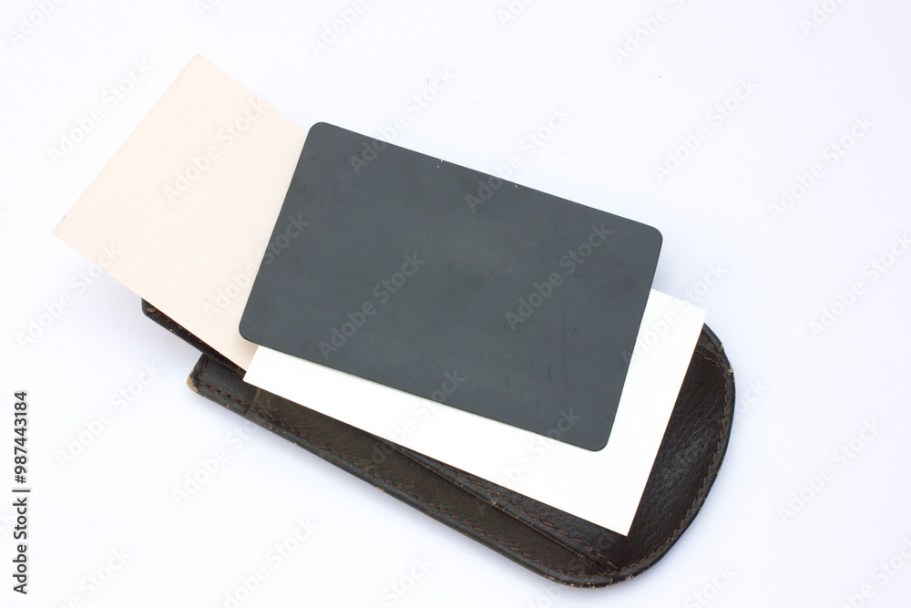 Timeless Wallet Design Against White Background. The inclusion of empty cards suggests themes related to identity, finance, or business. Timeless Wallet Design Against White Background. The inclusion of empty cards suggests themes related to identity, finance, or business.
