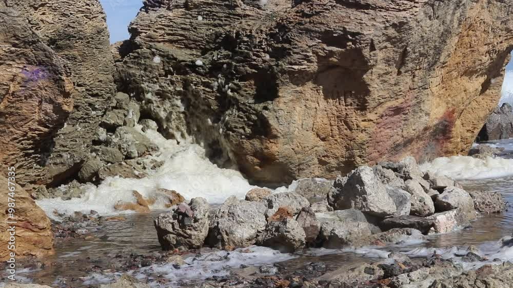 The storm foam is between the stones The storm foam is between the stones