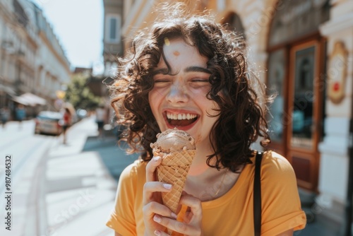 Kid's favorite moment is enjoying ice cream.  Portrait of youthful lady vibrant curly hair. Youthful charm and trendy style illustrate contemporary teen life. photo