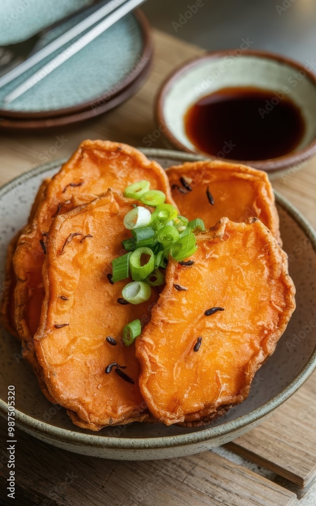 Sweet Potato Tempura Garnished with Green Onions and Dipping Sauce Sweet Potato Tempura Garnished with Green Onions and Dipping Sauce