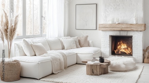 White corner sofa near a fireplace in Scandinavian living room with soft textures, wood elements, and a calming neutral palette