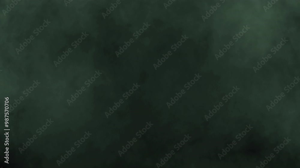 Green smoke is moving at the top of the frame on black
