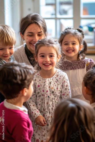 A joyful group of children and an adult sharing a moment of happiness in a bright room.