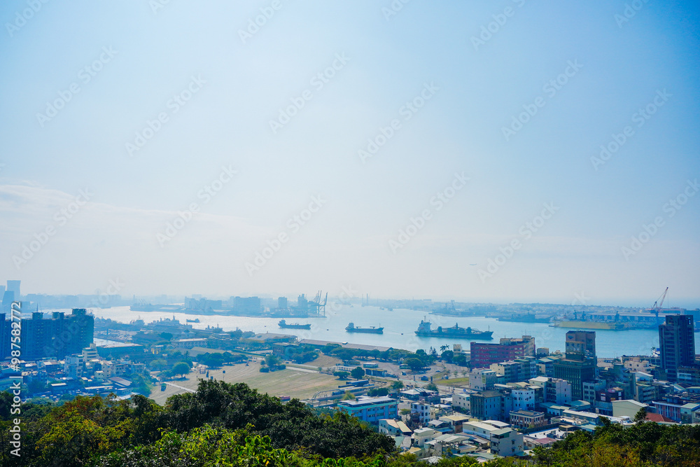 Kaohsiung, Taiwan, Republic of China, 01 25 2024: The landscape of Kaosiung port harbor, downtown, taiwan strait, and shoushan mountain Kaohsiung, Taiwan, Republic of China, 01 25 2024: The landscape of Kaosiung port harbor, downtown, taiwan strait, and shoushan mountain