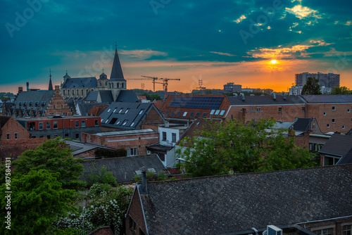 Canvas Print Roofs of brick houses with beautiful sky during sunset