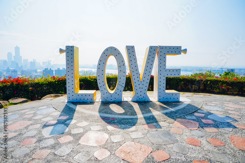 Kaohsiung, Taiwan, Republic of China, 01 25 2024: The landscape of Kaosiung port harbor, downtown, taiwan strait, and shoushan mountain  photo