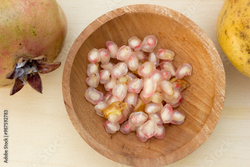 White Pomegranate: A rare and sweet variety of pomegranate, known for its juicy and less tart flavor compared to the traditional red pomegranate. photo