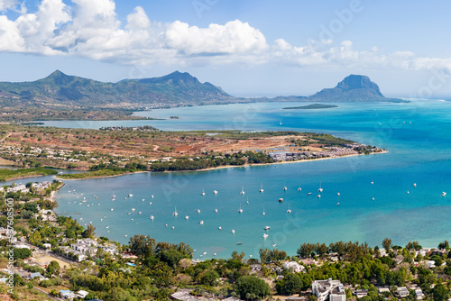 Aerial view: Mauritius island, sailboat and beautiful marina