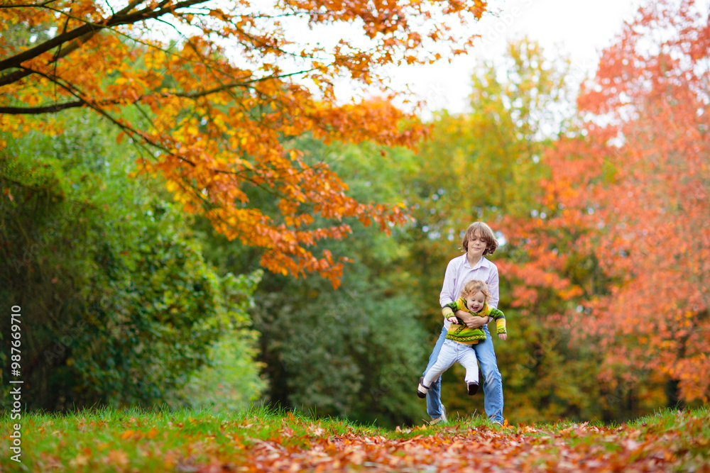 Kids playing in autumn park