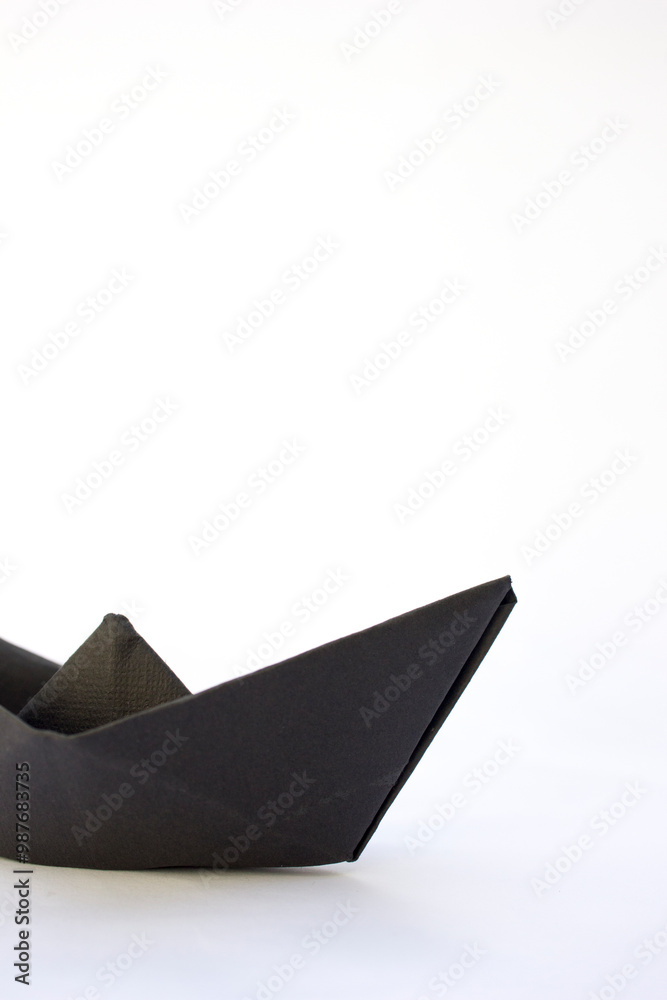 Origami Stealth Cruiser: A ninja-like boat in black folds. Origami Stealth Cruiser: A ninja-like boat in black folds.