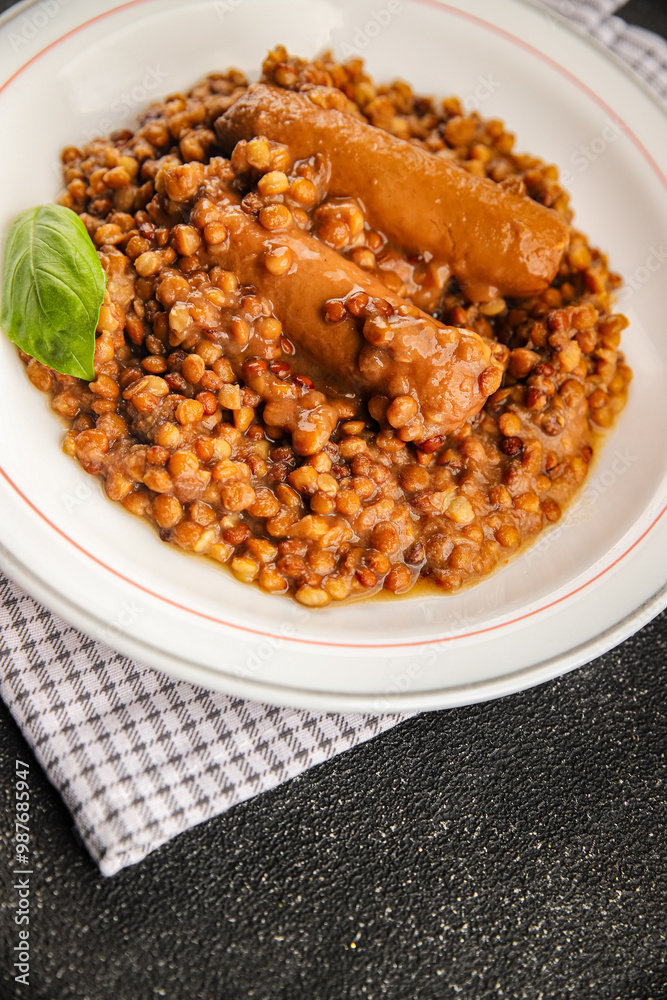 Lentil with sausages tasty food dish second course аresh delicious gourmet food background on the table rustic food top view copy space top view Lentil with sausages tasty food dish second course аresh delicious gourmet food background on the table rustic food top view copy space top view