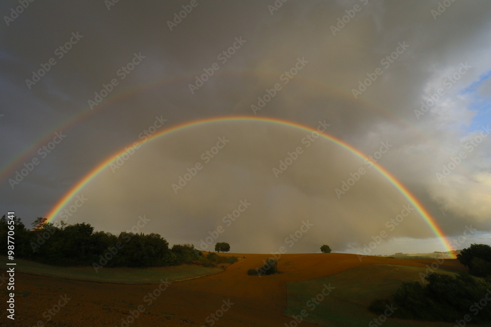 Double arc en ciel dans la campagne gersoise Double arc en ciel dans la campagne gersoise