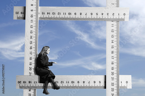 Collage with a young woman in in black coat and wooden ruler	 photo