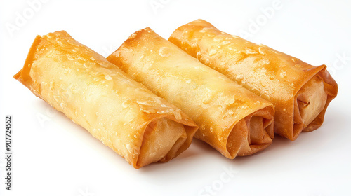 Three crispy and golden brown spring rolls are displayed on a clean white background, emphasizing their appetizing texture and color, ideal for culinary presentations.