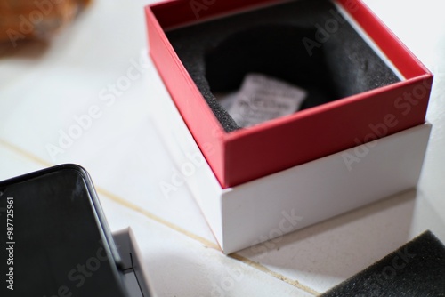 Rokan Hilir, 09-16-2024: Red and White Gift Box Detail photo