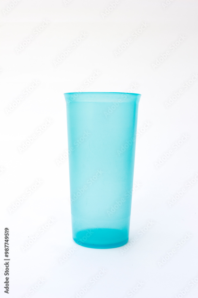 A bright blue plastic glass, perfect for outdoor picnics, barbecues, or beach outings, representing the joy of summer. A bright blue plastic glass, perfect for outdoor picnics, barbecues, or beach outings, representing the joy of summer.