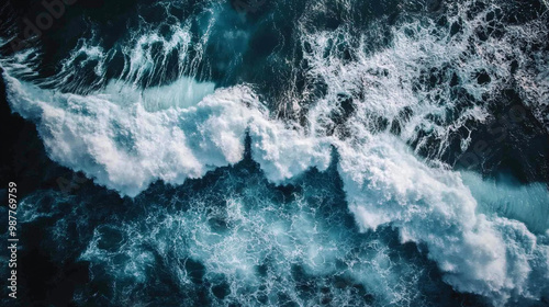 Aerial View of Turbulent Ocean Waves, Giant ocean wave breaking creating whitewash in turquoise water.