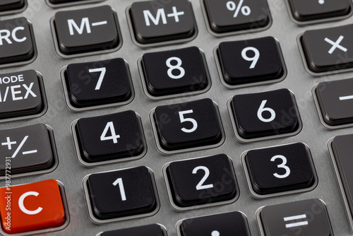 Closeup of calculator keyboard. Finance, business and debt concept.