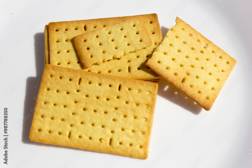 Vibrant salty cheese biscuits in various shapes, adding a pop of color and sweetness to any dessert table.