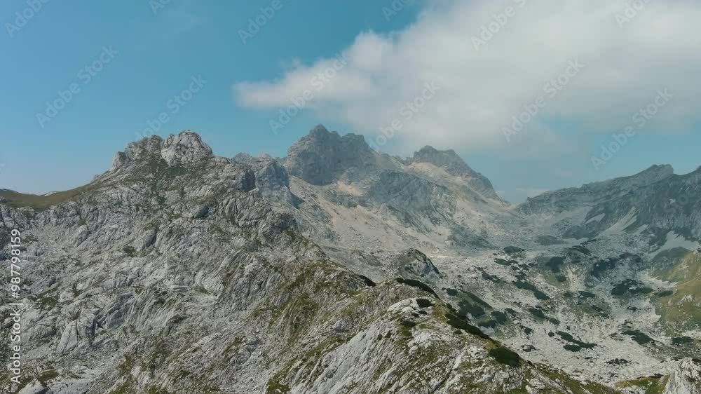 Flying in Durmitor mountains. Durmitor National park in Montenegro. Beautiful aerial mountain landscape, 4k