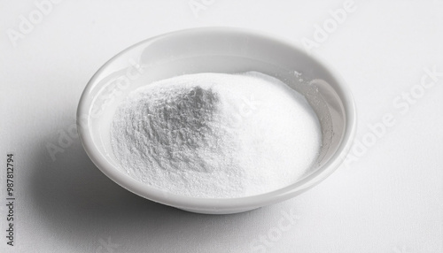 White zinc oxide powder in bowl on white table. Healthcare and medical supplement product.