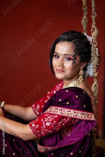 Timeless Elegance: A Marathi Woman Enjoying Peaceful Time on a Swing