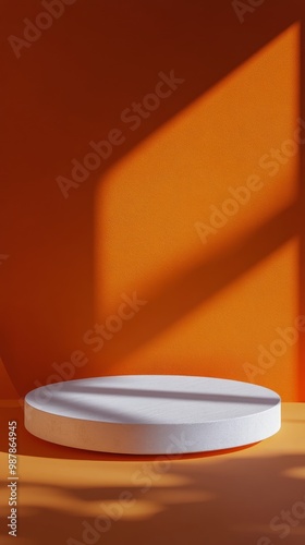 A striking orange display featuring geometric shapes and shadows during dayli...