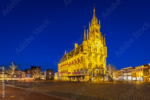 City hall in historical city Gouda, the Netherlands during dusk