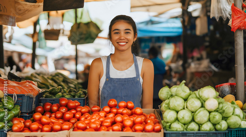 Cheerful happy Asian woman, seller or farmer selling fresh organic vegetables at a farmers market, smiling as she stands at her produce stall, promoting healthy, locally grown food, agriculture field