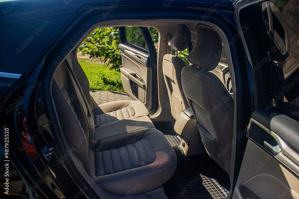 Back seats in a black car Back seats in a black car