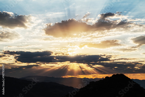 Dawn sunbeams breaking thro...