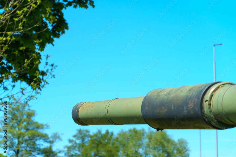 A Soviet military tank. Dynamic protection on the tank body. Elements of an armored vehicle in close-up, tracks and a cannon. A Soviet military tank. Dynamic protection on the tank body. Elements of an armored vehicle in close-up, tracks and a cannon.