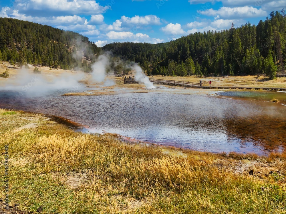 Autumn at Firehole Lake in Yellowstone National Park in Wyoming. Autumn at Firehole Lake in Yellowstone National Park in Wyoming.