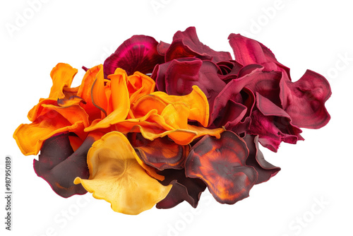 A colorful assortment of sweet potatoes and beet chips, including orange and red pieces, are piled together on a transparent background.