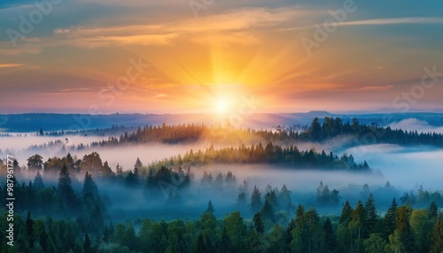 Amazing Sunrise Over Misty Landscape. Scenic View Of Foggy Morning Sky With Rising Sun Above Misty Forest. Middle Summer Nature Of Europe