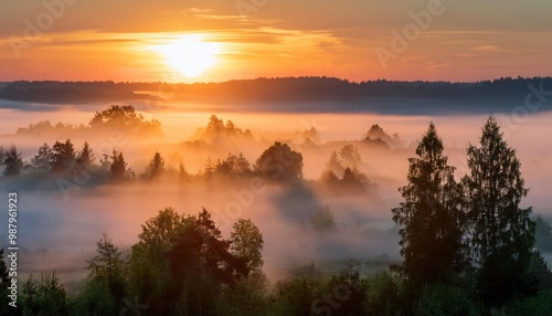 Amazing Sunrise Over Misty Landscape. Scenic View Of Foggy Morning Sky With Rising Sun Above Misty Forest. Middle Summer Nature Of Europe