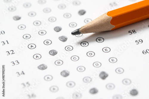 Pencil and multiple choice test sheet photo