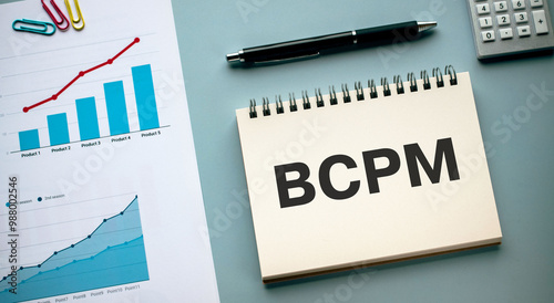 There is notebook with the word BCPM. It is an abbreviation for Business Continuity Plan Management as eye-catching image. photo