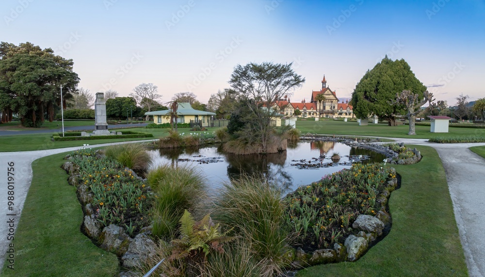 Fototapeta premium The Rotorua Museum, pond and park of the Government Gardens, Rotorua, Bay of Plenty, New Zealand.