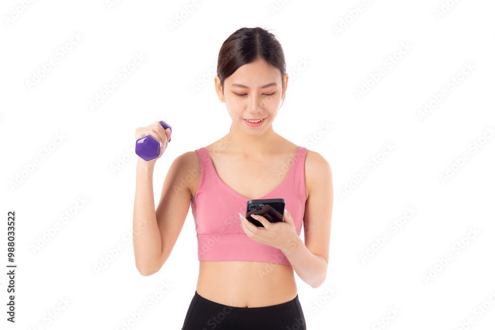 Portrait young asian woman lifting dumbbell and watching smartphone isolated white background, female fitness workout training holding dumbbell for muscle strong and strength, sport and health care. Portrait young asian woman lifting dumbbell and watching smartphone isolated white background, female fitness workout training holding dumbbell for muscle strong and strength, sport and health care.