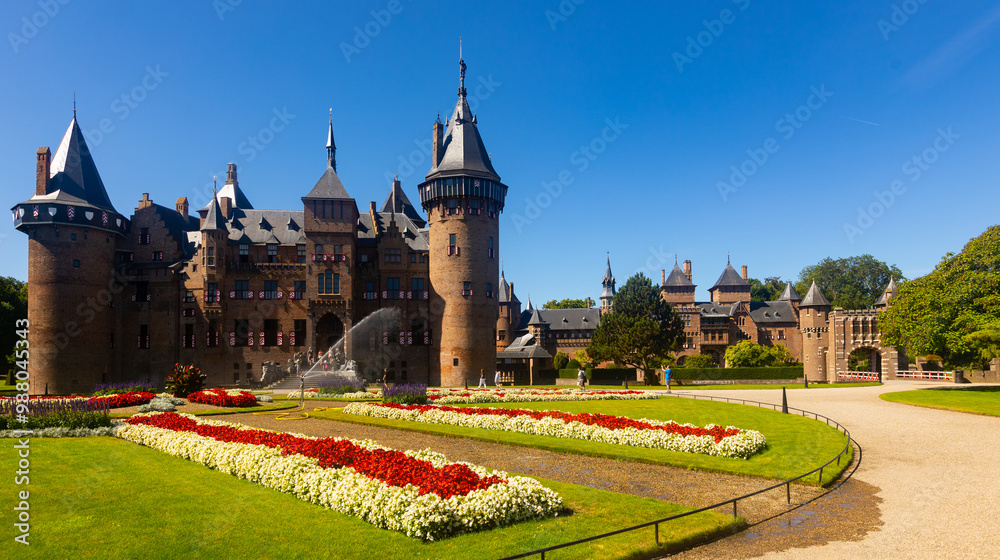 Fototapeta premium Summer landscape with a view of the ancient castle De Haar, located near the city of Utrecht and is one of the most visited ..places in the Netherlands