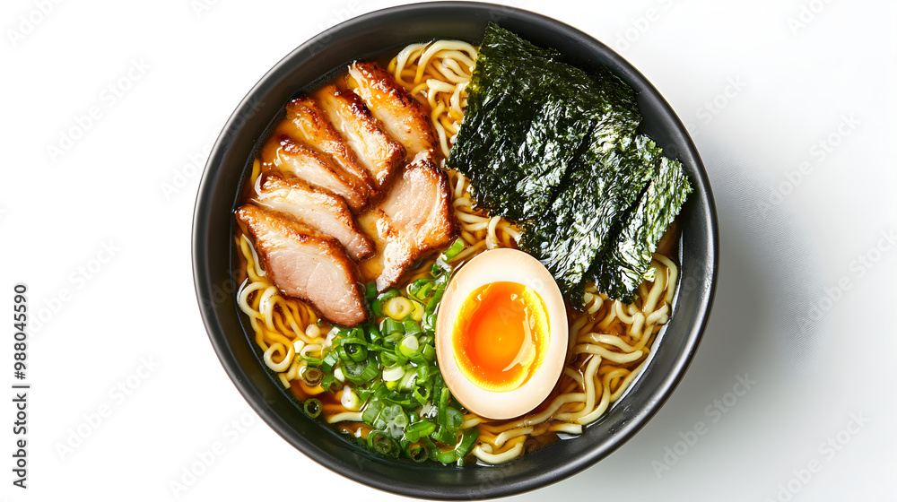 A bowl of ramen with noodles, soft-boiled egg, seaweed, and pork slices, shot from above A bowl of ramen with noodles, soft-boiled egg, seaweed, and pork slices, shot from above