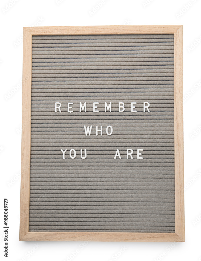 Letter board with phrase Remember who you are on white background, top view Letter board with phrase Remember who you are on white background, top view