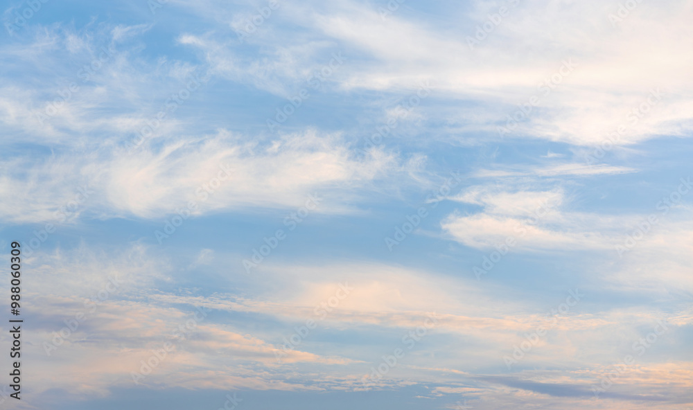 Late afternoon, faint white clouds in the blue sky. Late afternoon, faint white clouds in the blue sky.