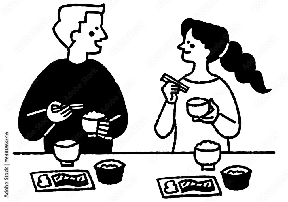 A man and woman happily eating a Japanese breakfast_2 A man and woman happily eating a Japanese breakfast_2