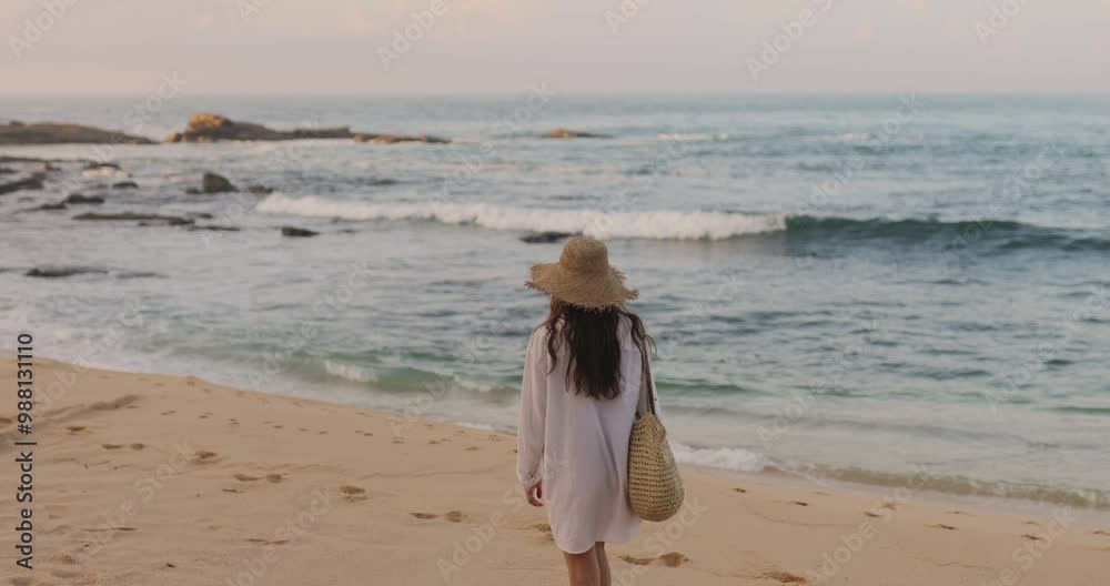 Woman Strolling on Rocky Beach at Sunrise in Sri Lanka Woman Strolling on Rocky Beach at Sunrise in Sri Lanka