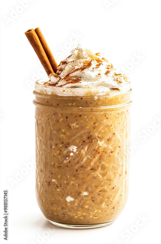 A Jar of Pumpkin Spice Overnight Oats with a Dollop of Whipped Cream for a Seasonal and Nutritious Breakfast