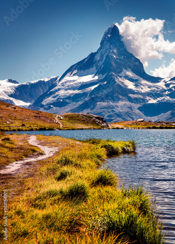 Colorful summer view of the Stellisee lake.